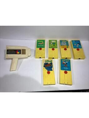 VINTAGE 1973 FISHER PRICE MOVIE VIEWER W/6 CARTRIDGES BUGS, DISNEY WORKS